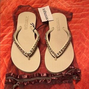 NWOB Mystique beige & gold rhinestone flip flops size 7/8 or 38